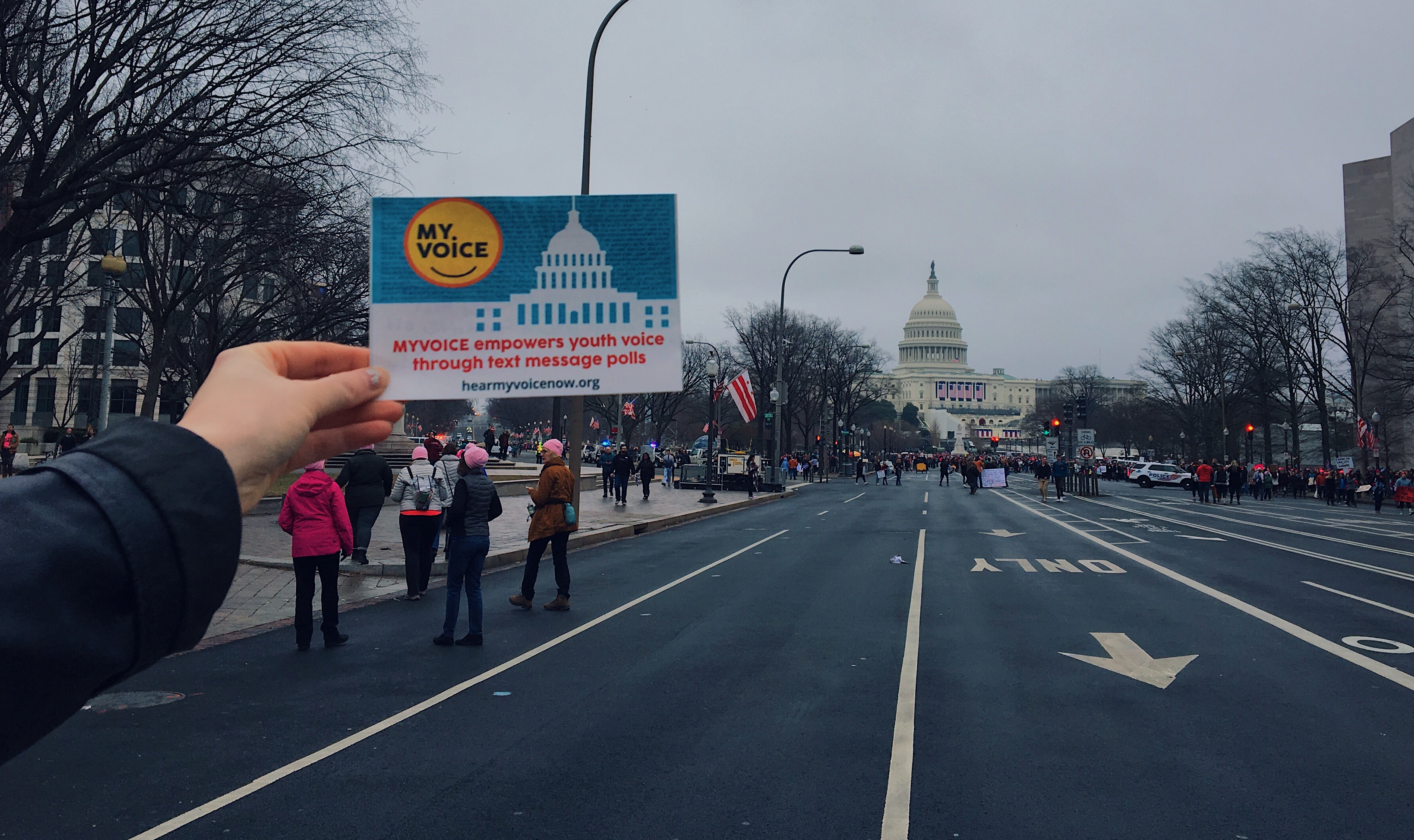 My Voice in DC 1 myvoice post card held in front of white house in washington dc